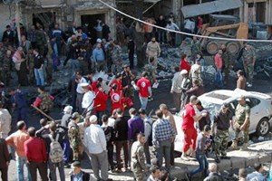 Hiện trường một vụ đánh bom xe ở Homs, ngày 24/10.